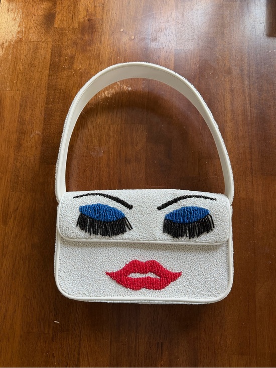 STAUD Handbags - STAUD White Beaded Shoulder Bag with Blue Eye Detail and Red Lips